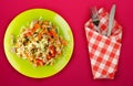 Salad with chicken stomachs with vegetables carrots, onions, peppers, cabbage, tomato, broccoli . salad with chicken on a green Royalty Free Stock Photo