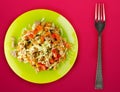 Salad with chicken stomachs with vegetables . salad with chicken on a green plate on a red background Royalty Free Stock Photo