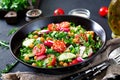 Salad of chickpeas, tomatoes, cucumbers, radish and greens. Royalty Free Stock Photo