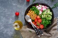 Salad of chickpeas, tomatoes, cucumbers, radish and greens. Royalty Free Stock Photo