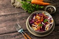 Salad Cole Slaw. Autumn Cabbage salad in a bowl on a rustic wooden table. Royalty Free Stock Photo