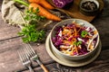 Salad Cole Slaw. Autumn Cabbage salad in a bowl on a rustic wooden table. Royalty Free Stock Photo