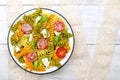 Salad with colorful pasta, cherry tomatoes, feta cheese and fresh basil Royalty Free Stock Photo