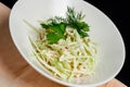 Salad with crab, cucumber and cabbage cutted in straws