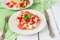 Salad from crabmeat sticks and tomatoes Royalty Free Stock Photo