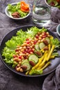 Salad with cucumber, pepper, pomegranate chick-pea Royalty Free Stock Photo