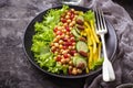 Salad with cucumber, pepper, pomegranate chick-pea Royalty Free Stock Photo