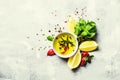 Salad dressing with basil, olive oil, garlic, lemon and spices, Royalty Free Stock Photo