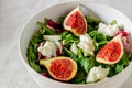 Salad with figs, cheese and honey. Healthy eating