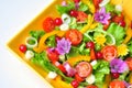 Salad with flowers, fruit and vegetables Royalty Free Stock Photo