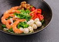 Salad with fresh arugula leaves, mozzarella cheese and shrimps Royalty Free Stock Photo