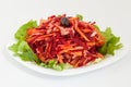 Salad of fresh beets and carrots in white plate Royalty Free Stock Photo
