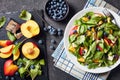 Salad with fresh chard, cheese, fruits, berries