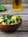 Salad of fresh chard and orange with pine nuts