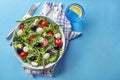 Green Salad with mozzarella cheese, black olives, arugula and tomato Royalty Free Stock Photo