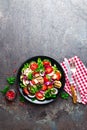 Salad with fresh and grilled vegetables and mushrooms. Vegetable salad with grilled champignons. Vegetable salad on plate Royalty Free Stock Photo