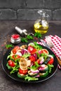 Salad with fresh and grilled vegetables and mushrooms. Vegetable salad with grilled champignons. Vegetable salad on plate Royalty Free Stock Photo