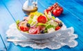 Salad. Fresh summer lettuce salad.Healthy mediterranean salad olives tomatoes parmesan cheese and prosciutto Royalty Free Stock Photo