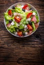 Salad. Fresh summer lettuce salad.Healthy mediterranean salad olives tomatoes parmesan cheese and prosciutto Royalty Free Stock Photo