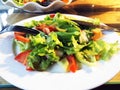 Salad. Fresh summer lettuce salad.Healthy mediterranean salad on wooden table. Vegetarian food Royalty Free Stock Photo