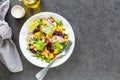 Salad of fresh vegetables with beetroot, arugula and red onion. Top View Royalty Free Stock Photo