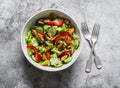 Salad with fresh vegetables and canned mussels on a gray background, top view. Delicious healthy diet food Royalty Free Stock Photo