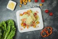 Salad with fresh vegetables, cheese, and fish. Tasty homemade food. Flat lay