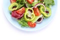 Salad of fresh vegetables isolated on white background Royalty Free Stock Photo