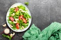 Salad with fresh vegetables and nuts. Vegetable salad with fresh vegetables and cashew. Vegetable salad on plate Royalty Free Stock Photo