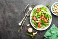 Salad with fresh vegetables and nuts. Vegetable salad with fresh vegetables and cashew. Vegetable salad on plate Royalty Free Stock Photo