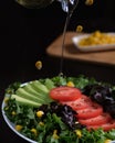 Salad with fresh vegetables and olive oil lettuce, tomato and avocado