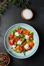 Salad with fresh vegetables and peach closeup. Fresh Summer Salad with Peaches and Buratta Cheese Royalty Free Stock Photo