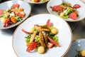 Salad with fried fish fillet red mullet. Royalty Free Stock Photo