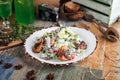 Salad with fried quail mushrooms and greens