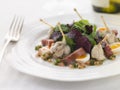 Salad of Frog Legs Lardons and Quail Eggs Royalty Free Stock Photo