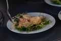 Salad with gamba`s on white plate