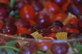 Salad in a glass dish. Rocket salad with grapes