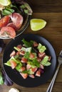 Salad with grapefruit, lose weigh food. Diet plan. Wooden rustic table