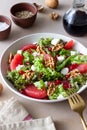 Salad with grapefruit, white cheese, pomegranate and nuts. Healthy eating. Vegetarian food. Diet
