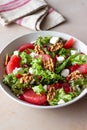 Salad with grapefruit, white cheese, pomegranate and nuts. Healthy eating. Vegetarian food. Diet