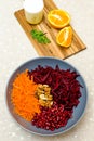 Salad of grated red beets carrots pomegranates and walnuts Royalty Free Stock Photo