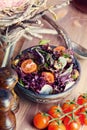 Salad with greens and tomatoes Royalty Free Stock Photo
