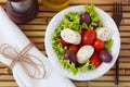 Salad of heart of palm (palmito), cherry tomatos, olives, black Royalty Free Stock Photo