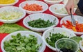 Salad ingredients in white platic plates Royalty Free Stock Photo