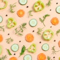 Salad ingredients layout. Food pattern with carrot, cucumbers, radish, greens, pepper and spices