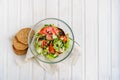 Salad of lettuce leaf, tomato, cucumber, onion, oregano Royalty Free Stock Photo