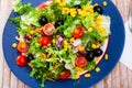 Salad with lettuce, tomato, corn and olives Royalty Free Stock Photo