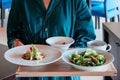 Salad, Linguine Pasta Pesto Sauce serving on wood tray Royalty Free Stock Photo