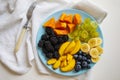 Salad Made From Fresh Summer Fruits On Blue Plate. Royalty Free Stock Photo