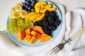 Salad Made From Fresh Summer Fruits On Blue Plate. Royalty Free Stock Photo